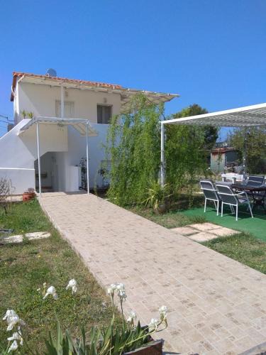 Chalcis House | Angel House