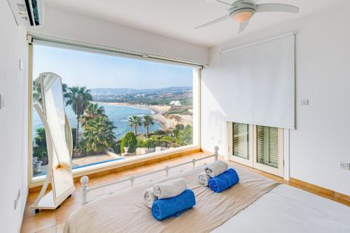 Kissonerga Villa | Beach Front Villa Mer Blu by Ezoria Villas