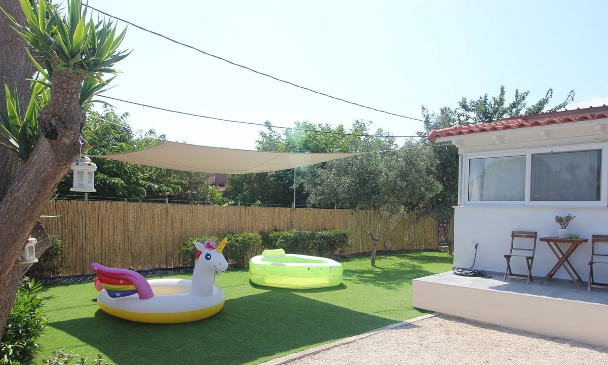 Skafidia House | Brand new house with garden, next to the beach.