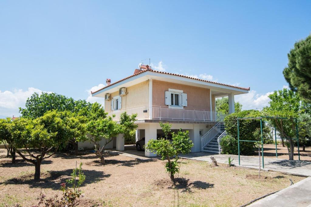 Eretria House | Emerald House