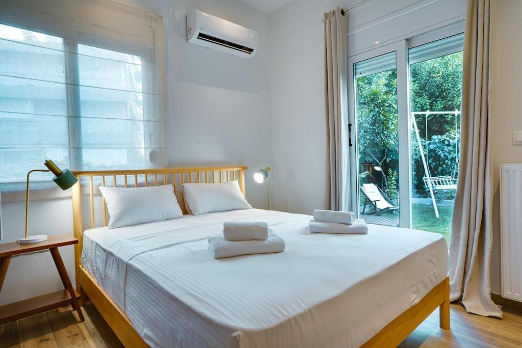 Papagou-Holargos Apartment | Garden Level Gem in the City