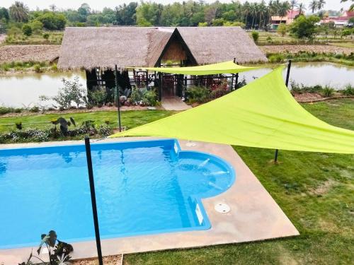 Nikhom Kham Soi Resort | Isaan Country Retreat