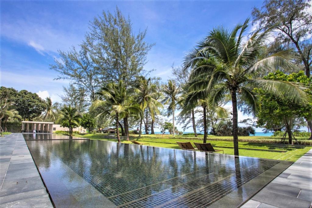 Mai Khao Apartment | Luxury Oceanfront pool access apartment