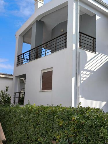 Polichrono House | Polychrono Waves