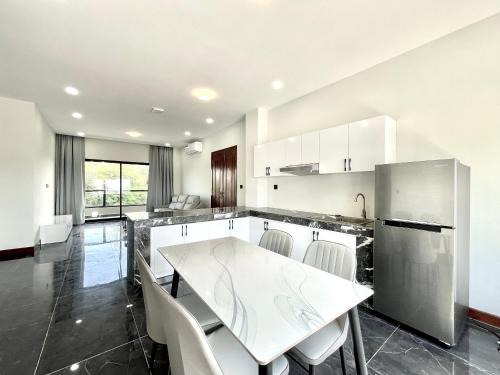 Mittakpheap Apartment | Sky Hotel - Cinema rooms & Apartments - Free laundry