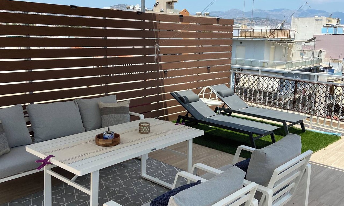 Peristeri Apartment | Two-bedrooms luxury penthouse. Includes sunny terrace with dining area, sunbeds.
