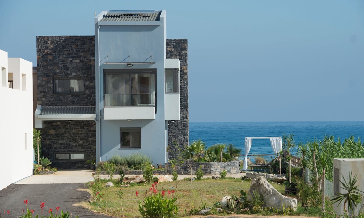 Adelianos Kampos Villa | Villa al Mare. Beachfront with private sunbeds and sunshades!