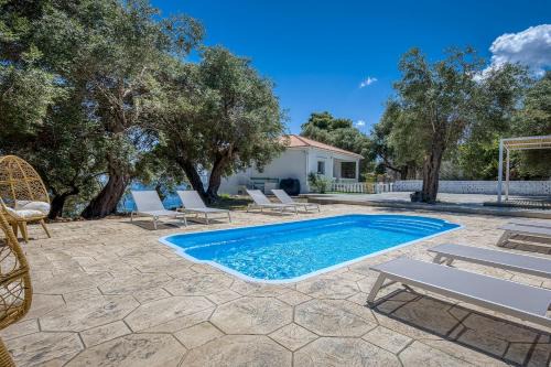 Perama Villa | Villa Ninemia Seaview by Estia