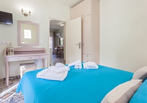 Suite with separate bedroom and mountain view