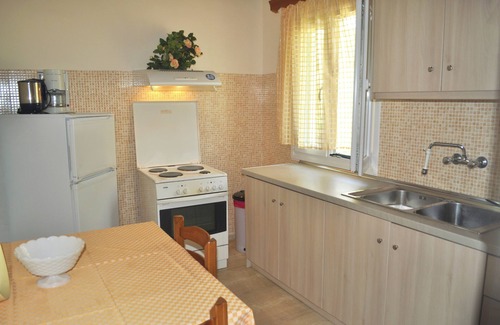 Agios Gordios House | Beachfront Vacation Home "eftichia"