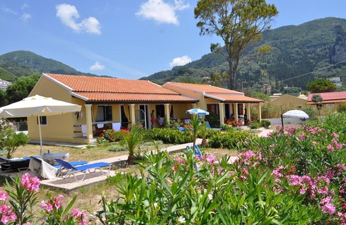 Agios Gordios House | Beachfront Vacation Home "eftichia"