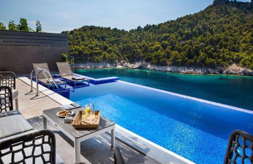 Frourion Villa | Exquisite Kefalonia Villa Villa Arystar 1 Bedroom Seafornt Spectacular Sea Views Private Outdoor Infinity Pool Assos