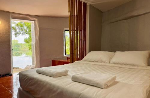 Khanong Phra Cabin | บ้านดิน 2 ชั้น