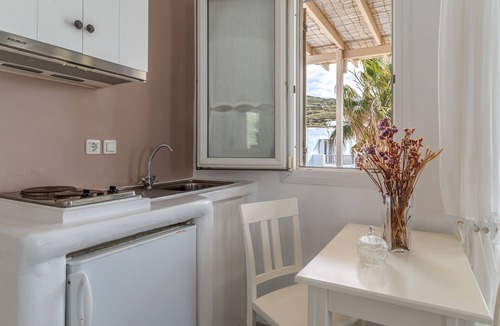 Kionia Apartment | Apartment In A Hotel 'Ninemia Suites Tinos Superior 201' with Sea View, Wi-Fi and Air Conditioning