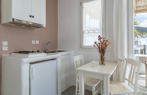 Kionia Apartment | Apartment In A Hotel 'Ninemia Suites Tinos Superior 201' with Sea View, Wi-Fi and Air Conditioning