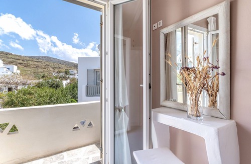 Kionia Apartment | Apartment In A Hotel 'Ninemia Suites Tinos Grand 205' with Sea View, Wi-Fi and Air Conditioning