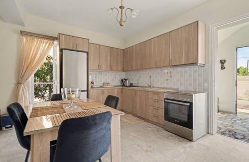 Kourouta House | Blossom Beachfront House with Private Terrace, Wi-Fi, and Air Conditioning
