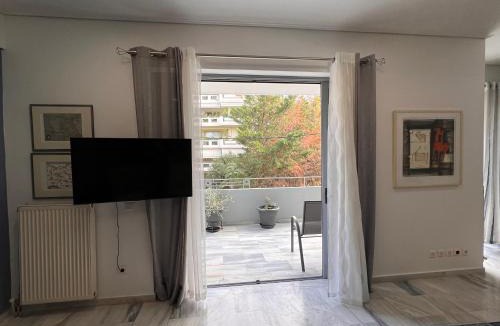 Khalandrion Apartment | Blue Spacious Flat wt Parking nr Marousi Hospitals, by PromosHomes