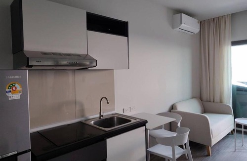Talat Phlu Apartment | Charming Bangkok Apartment with City, Pool, and River Views