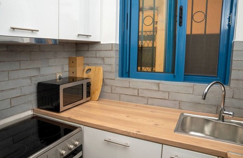 Filopappou House | Duplex with Private Rooftop Garden near Acropolis