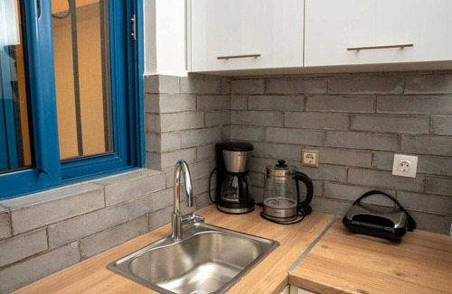 Filopappou House | Duplex with Private Rooftop Garden near Acropolis