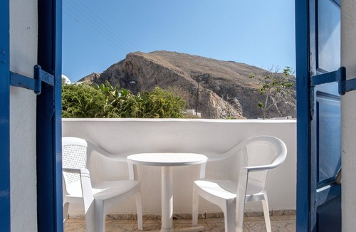 Perissa Apartment | Economy Quadruple Room 1 with Balcony and Air Conditioning