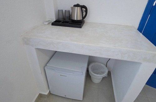 Perissa Apartment | Economy Quadruple Room 4 with Balcony and Air Conditioning