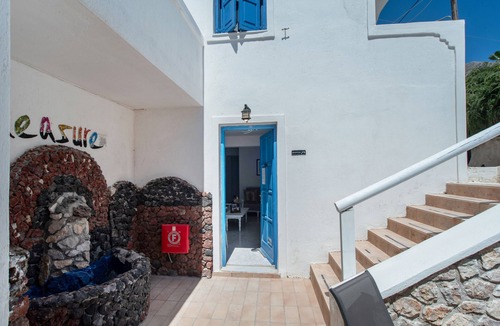 Perissa Apartment | Economy Quadruple Room 4 with Balcony and Air Conditioning
