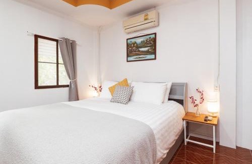 Haad Yao Ski Chalet | Garden Home 4