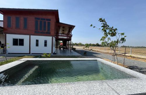 Buriram House | Lakeside Thai wooden House