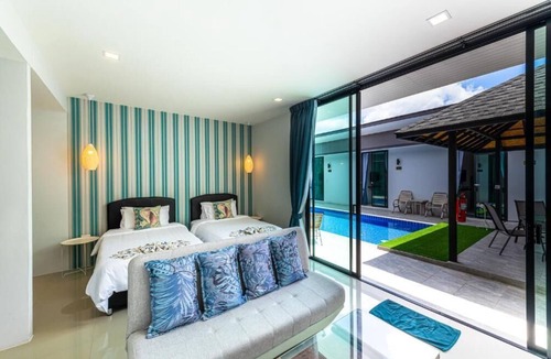 Si Sunthon Villa | Lespalm Resort by Vacayandco