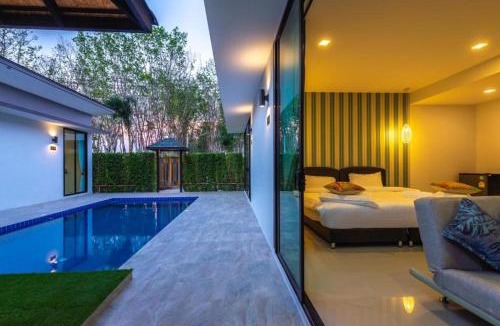 Si Sunthon Villa | Lespalm Resort by Vacayandco