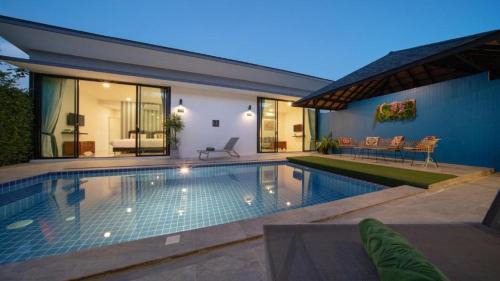 Si Sunthon Villa | Lespalm Resort by Vacayandco