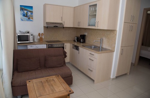 Makry Gialos Apartment | Luxury apartment in modern complex with bay and mountain views.