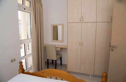 Makry Gialos Apartment | Luxury apartment in modern complex with bay and mountain views.
