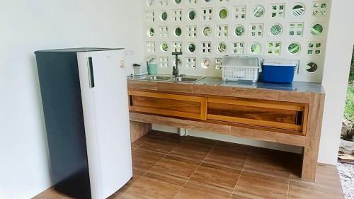 Khanom House | Maliblue khanom , coconut House Family