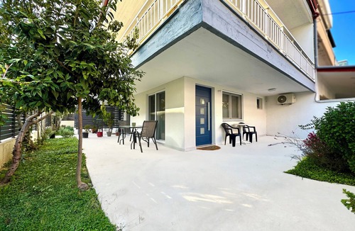 Olymbiaki Akti Apartment | Minimalist Seaside Apartment with Patio and Parking - Blue Zone Homes