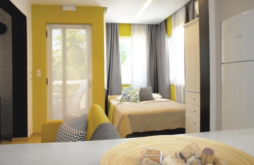 Heraklion Apartment | Modern house with garden and bathroom TV in front of the Venetial Walls