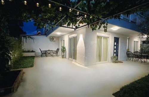 Olymbiaki Akti House | Modern Seaside Retreat with Private Patio and Parking - Blue Zone Homes