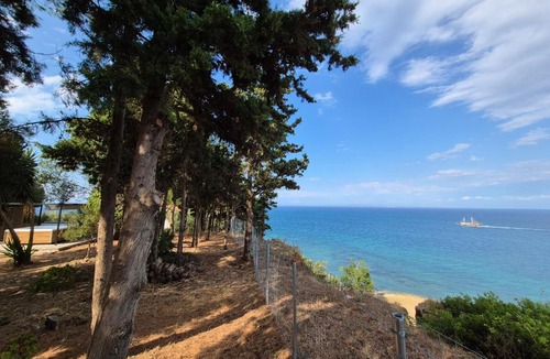 Akrotiri Villa | Olas y olivos