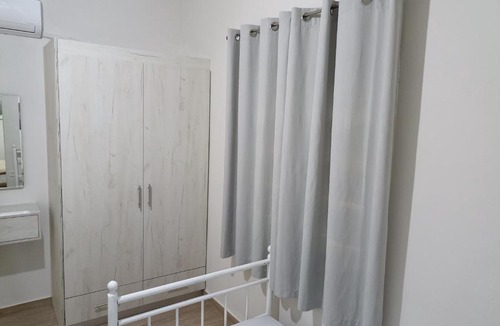 Arcoudi Apartment | palm-tree
