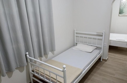 Arcoudi Apartment | palm-tree