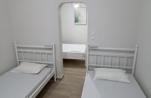 Arcoudi Apartment | palm-tree
