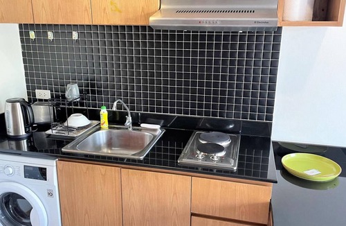 Ban Saiyuan Apartment | Peaceful Condo in Rawai, poolside apartment with washer