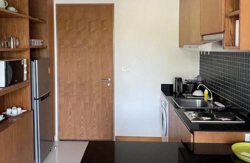 Ban Saiyuan Apartment | Peaceful Condo in Rawai, poolside apartment with washer