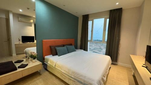 Jomtien Apartment | Sea View Condo in Grande Caribbean l Pool l Near Jomtien Beach and Walking Street