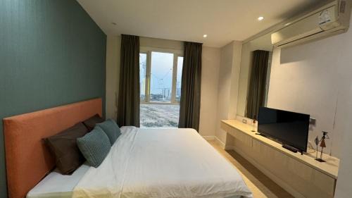Jomtien Apartment | Sea View Condo in Grande Caribbean l Pool l Near Jomtien Beach and Walking Street