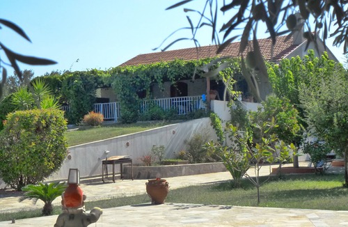 Chalcis Cottage | Seafront cottage with orchard and garden