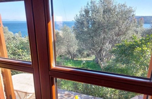 Karvelas House | Small holiday home with sea view in a quiet location near Vathy, Peloponnese.