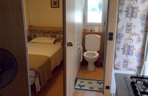 Lakkopetra House | Stationary caravan directly at the sea, garden, BBQ | Achaia, Peloponnese
